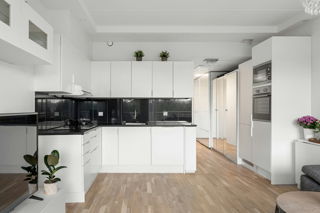 Clean and bright residential kitchen prepared for occupation
